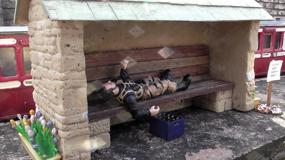 Model Man on Platform Asleep